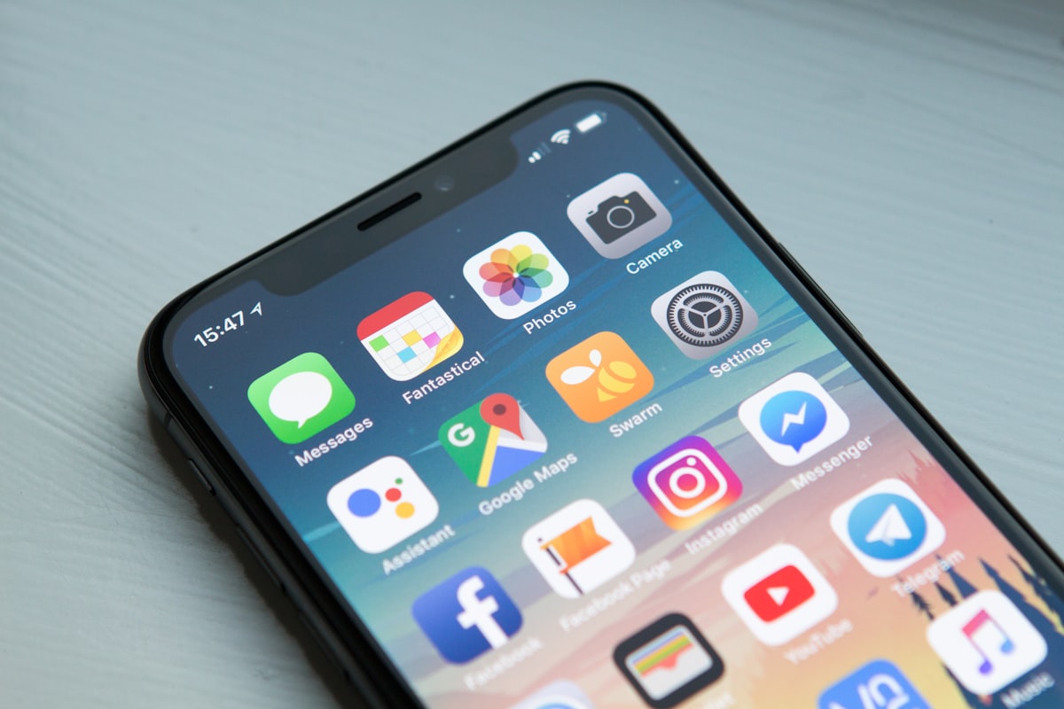 Smartphone home screen with Google Maps — where barbershop near me searches begin
